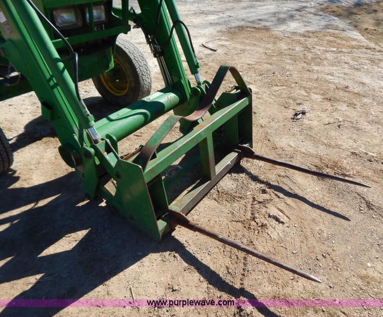 image for item B4864 2004 John Deere 6615 tractor