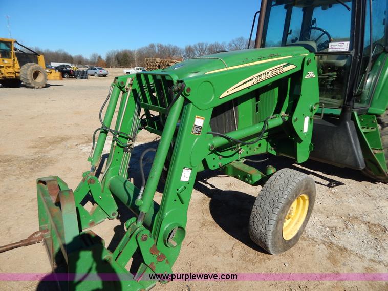 image for item B4864 2004 John Deere 6615 tractor