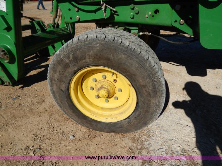 image for item B4864 2004 John Deere 6615 tractor