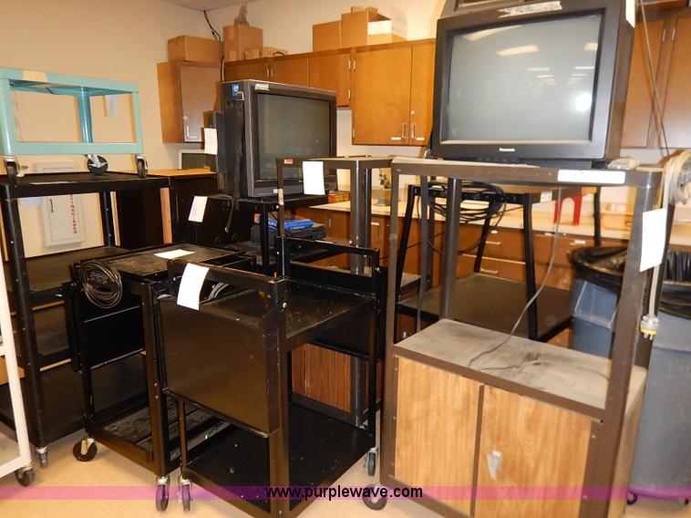 image for item AY9146 Assorted televisions and carts
