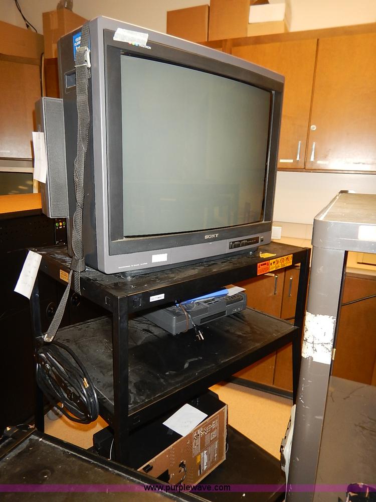 image for item AY9146 Assorted televisions and carts