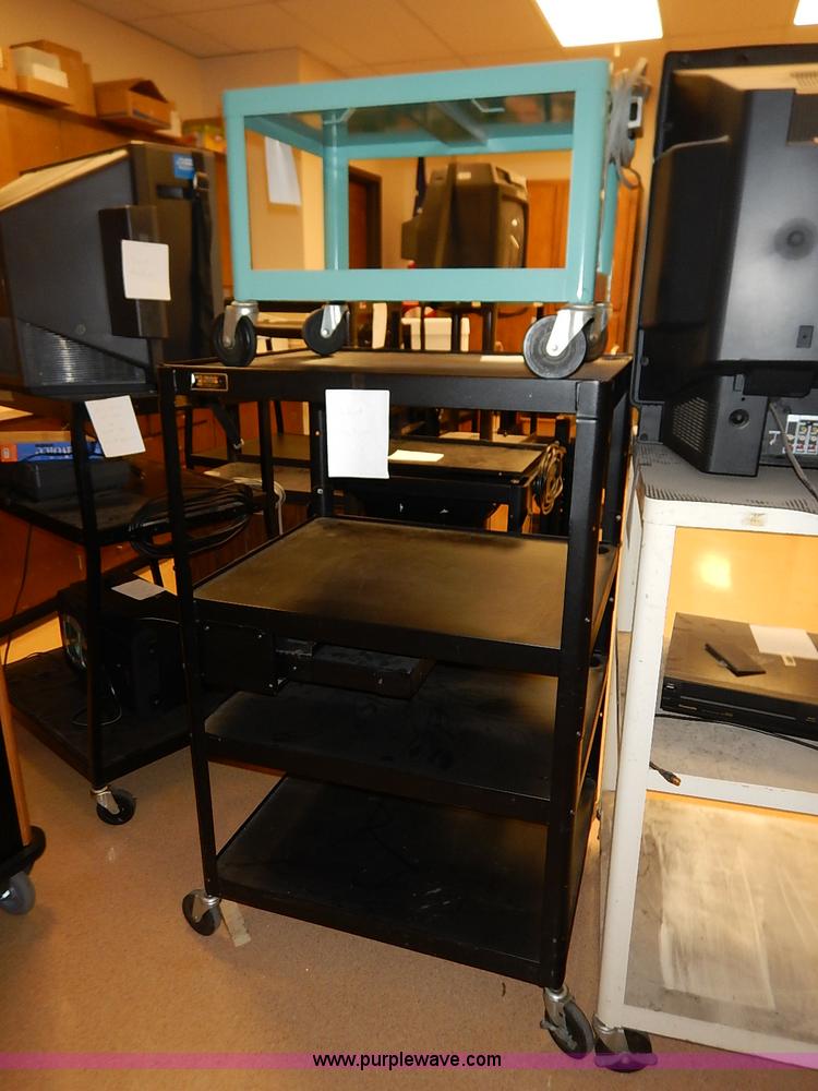 image for item AY9146 Assorted televisions and carts