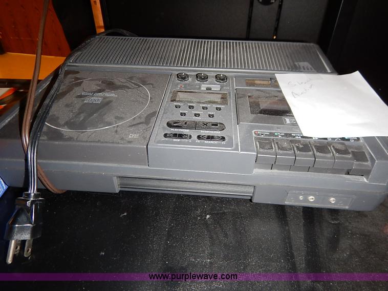 image for item AY9146 Assorted televisions and carts