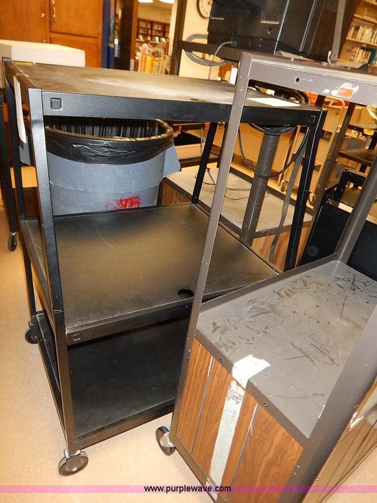 image for item AY9146 Assorted televisions and carts