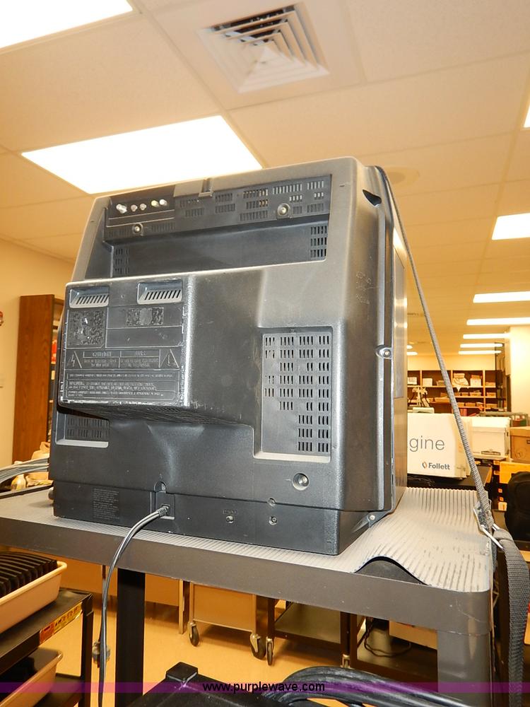 image for item AY9146 Assorted televisions and carts