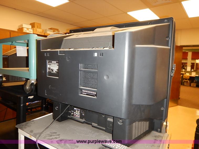 image for item AY9146 Assorted televisions and carts