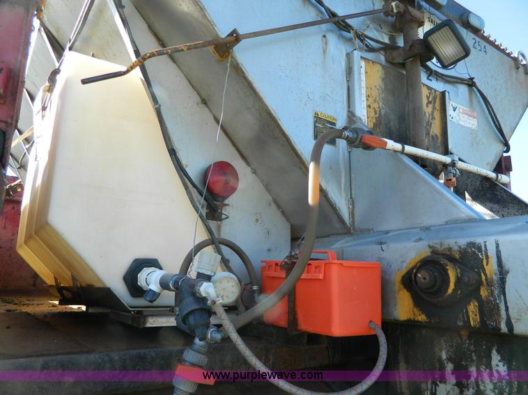 image for item H2384 1996 International 4700 dump truck