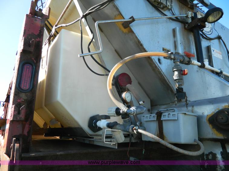 image for item H2385 1996 International 4700 dump truck