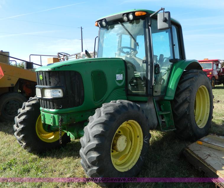 image for item H2399 2002 John Deere 6320 MFWD tractor