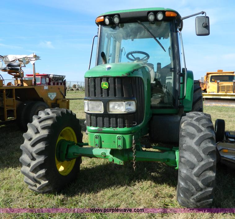 image for item H2399 2002 John Deere 6320 MFWD tractor