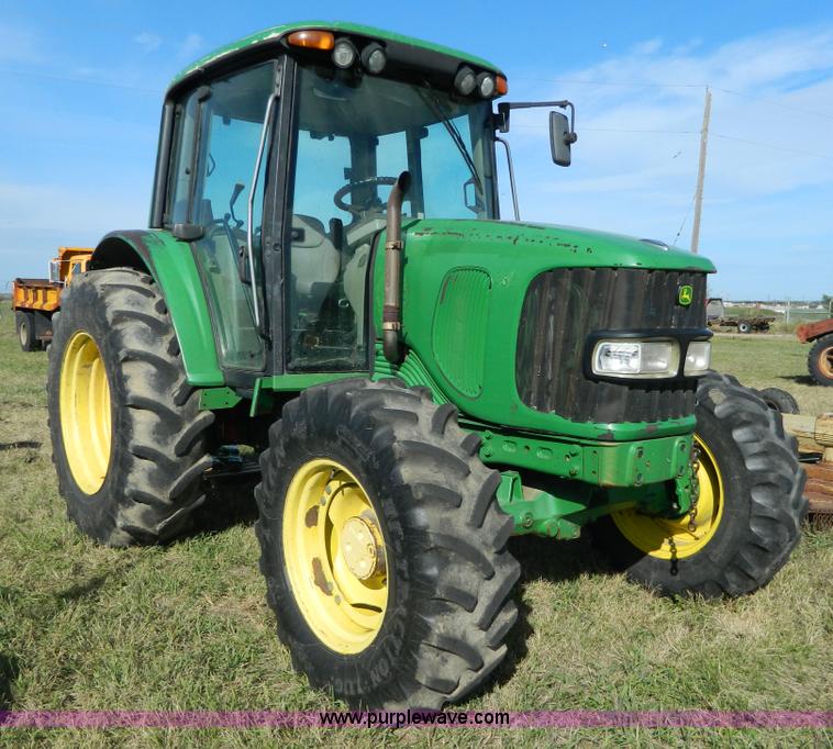 image for item H2399 2002 John Deere 6320 MFWD tractor