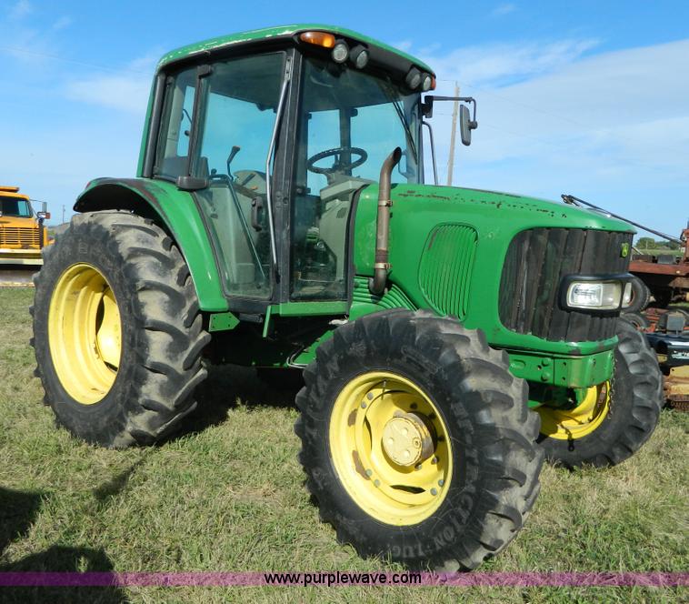 image for item H2399 2002 John Deere 6320 MFWD tractor
