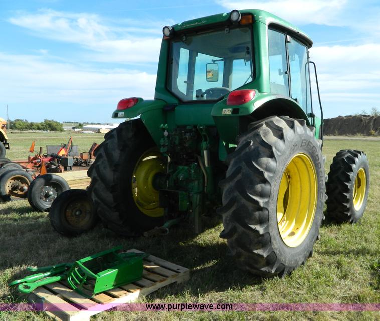 image for item H2399 2002 John Deere 6320 MFWD tractor