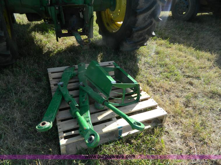 image for item H2399 2002 John Deere 6320 MFWD tractor