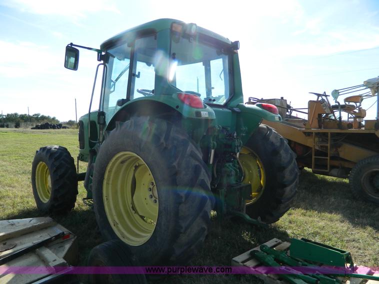 image for item H2399 2002 John Deere 6320 MFWD tractor