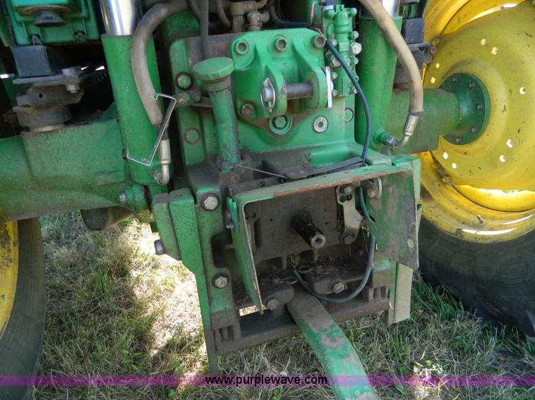 image for item H2399 2002 John Deere 6320 MFWD tractor