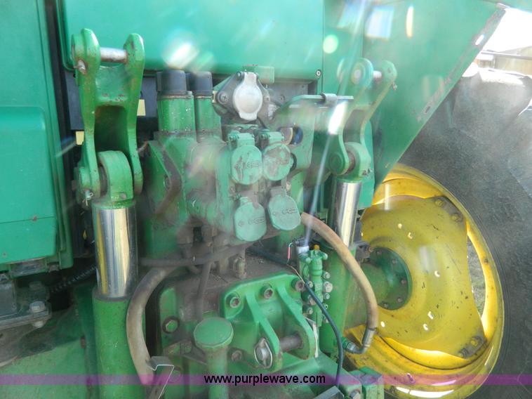 image for item H2399 2002 John Deere 6320 MFWD tractor