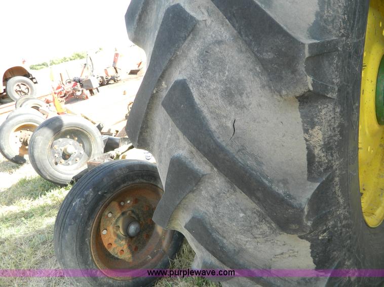 image for item H2399 2002 John Deere 6320 MFWD tractor