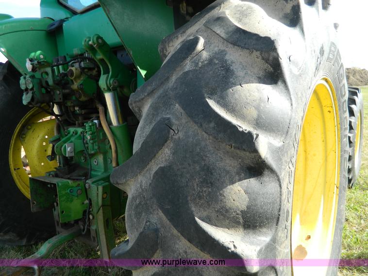 image for item H2399 2002 John Deere 6320 MFWD tractor