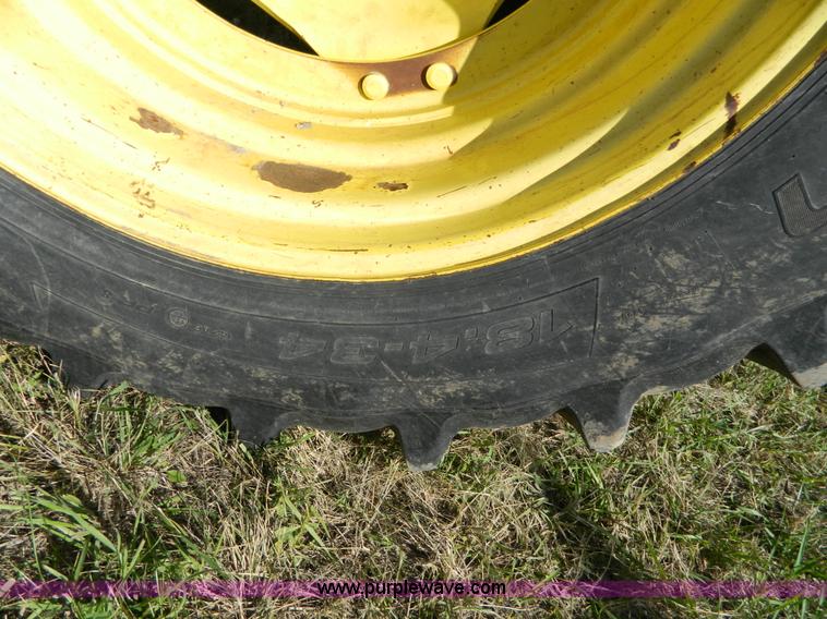 image for item H2399 2002 John Deere 6320 MFWD tractor