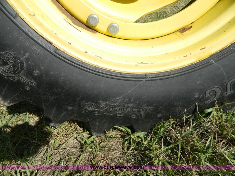 image for item H2399 2002 John Deere 6320 MFWD tractor