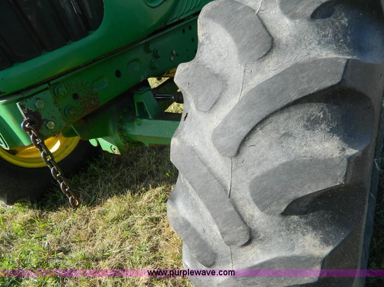 image for item H2399 2002 John Deere 6320 MFWD tractor