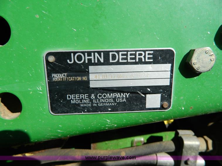 image for item H2399 2002 John Deere 6320 MFWD tractor