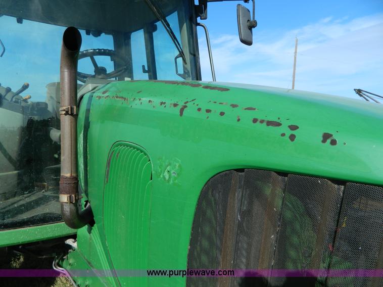image for item H2399 2002 John Deere 6320 MFWD tractor