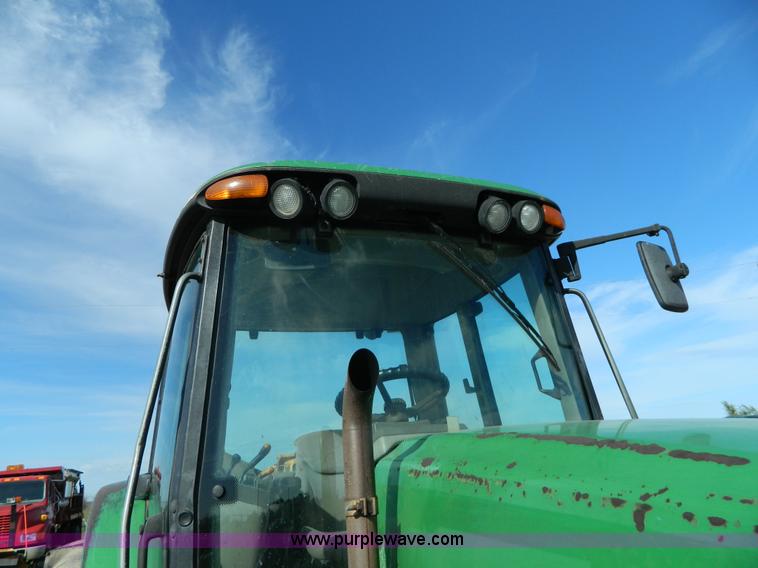 image for item H2399 2002 John Deere 6320 MFWD tractor