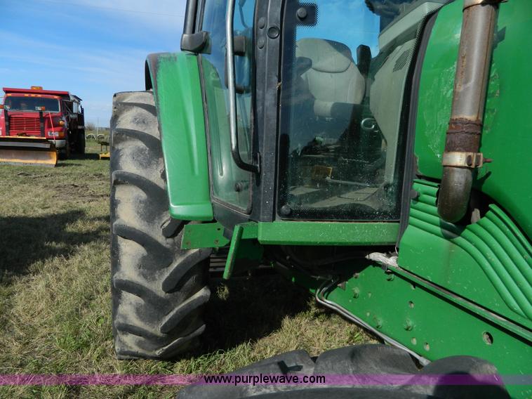 image for item H2399 2002 John Deere 6320 MFWD tractor