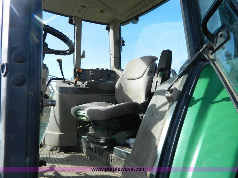 image for item H2399 2002 John Deere 6320 MFWD tractor