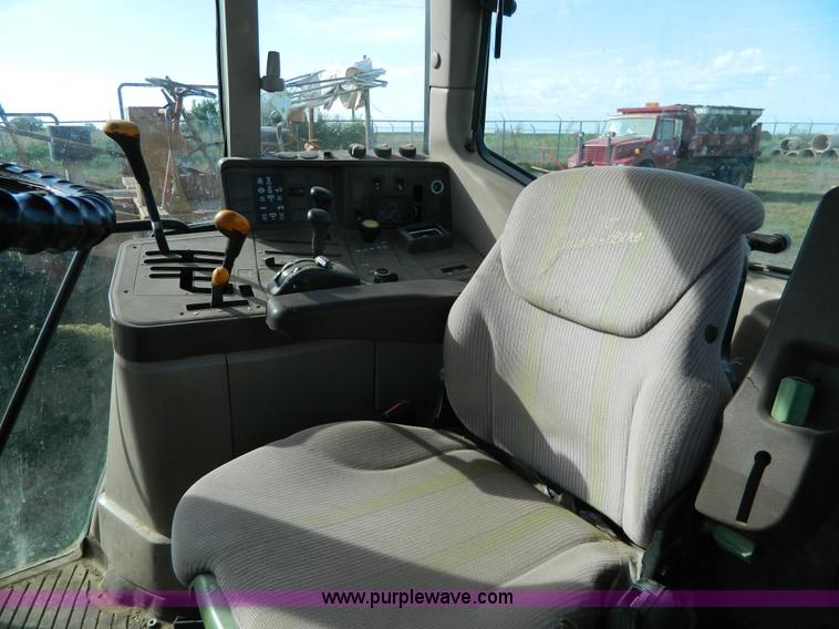 image for item H2399 2002 John Deere 6320 MFWD tractor