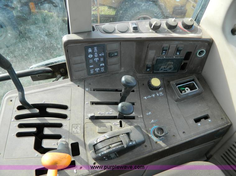 image for item H2399 2002 John Deere 6320 MFWD tractor