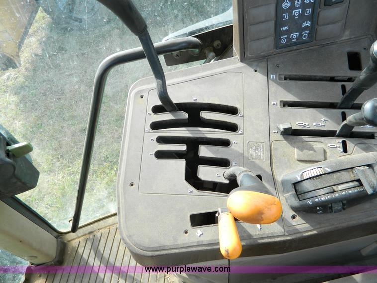 image for item H2399 2002 John Deere 6320 MFWD tractor