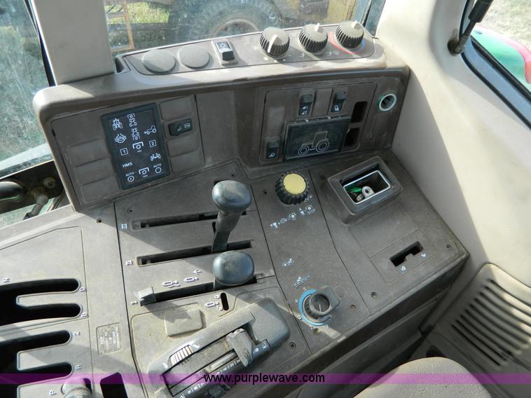 image for item H2399 2002 John Deere 6320 MFWD tractor