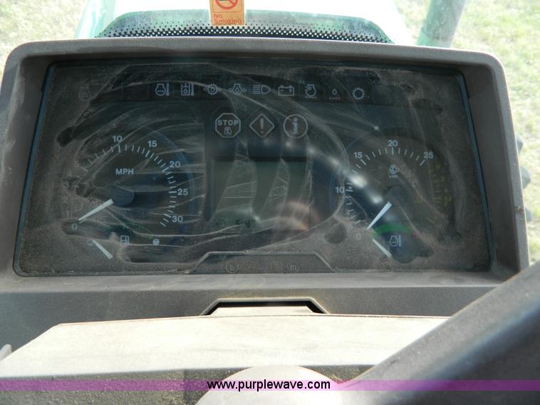 image for item H2399 2002 John Deere 6320 MFWD tractor