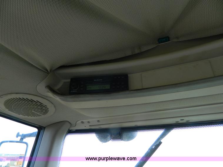 image for item H2399 2002 John Deere 6320 MFWD tractor