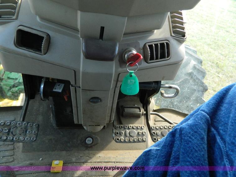 image for item H2399 2002 John Deere 6320 MFWD tractor