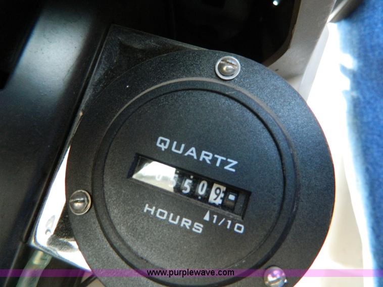 image for item H2399 2002 John Deere 6320 MFWD tractor