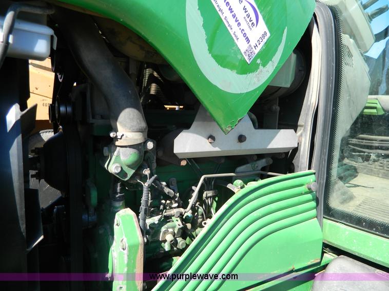 image for item H2399 2002 John Deere 6320 MFWD tractor