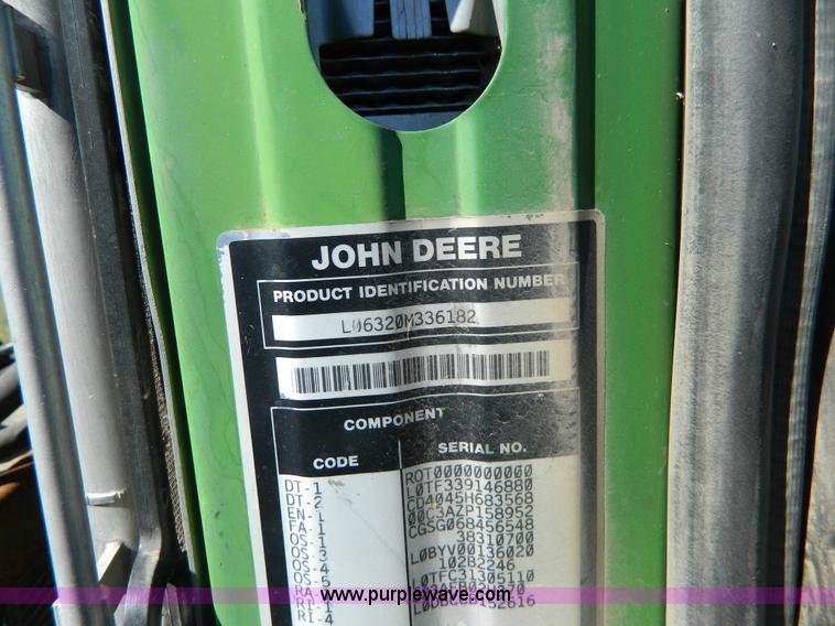 image for item H2399 2002 John Deere 6320 MFWD tractor