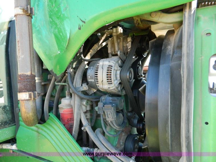 image for item H2399 2002 John Deere 6320 MFWD tractor