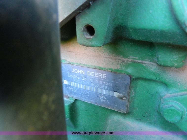 image for item H2399 2002 John Deere 6320 MFWD tractor