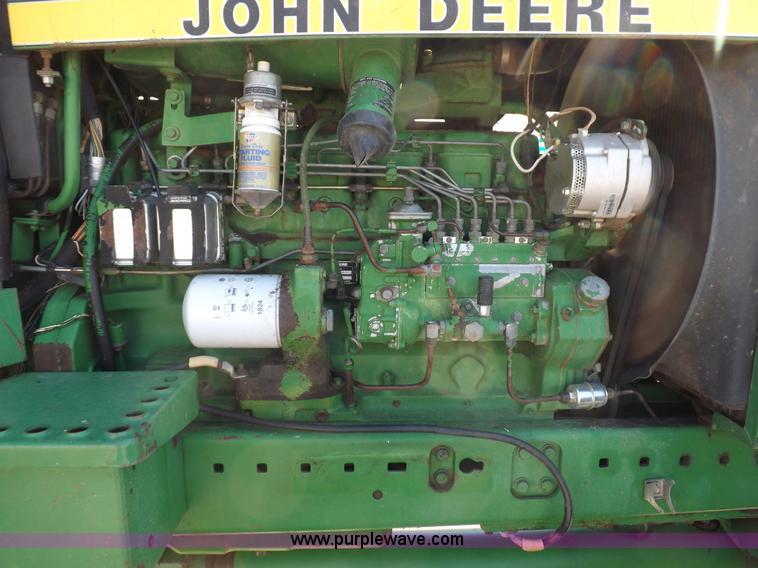 image for item H9095 1983 John Deere 4650 MFWD tractor