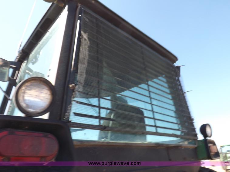 image for item H9095 1983 John Deere 4650 MFWD tractor