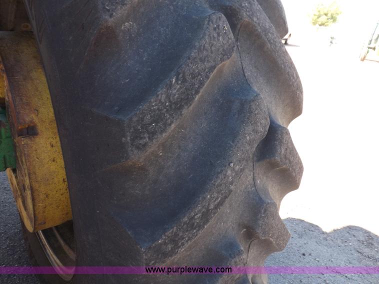 image for item H9095 1983 John Deere 4650 MFWD tractor