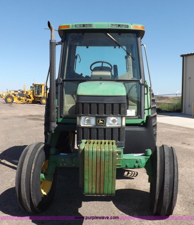 image for item H9096 1998 John Deere 6310 tractor