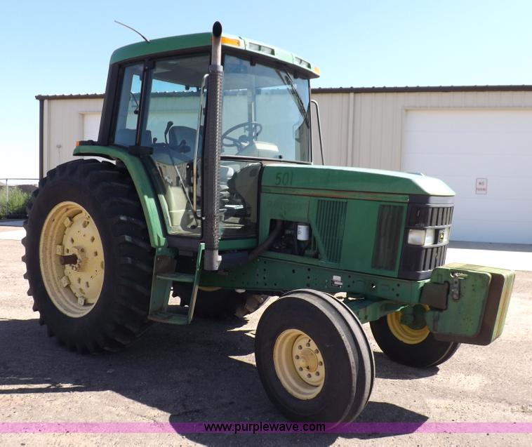 image for item H9096 1998 John Deere 6310 tractor
