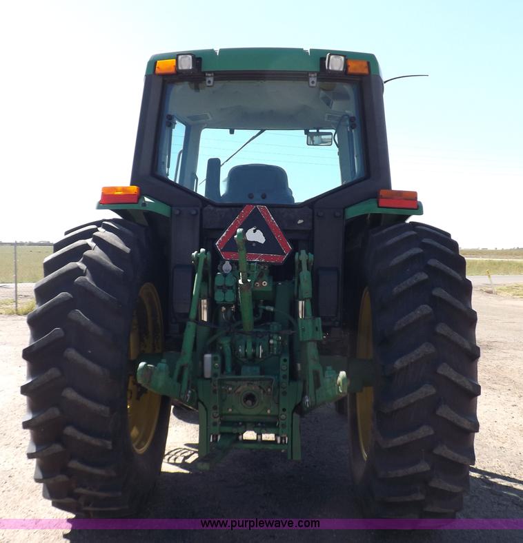 image for item H9096 1998 John Deere 6310 tractor
