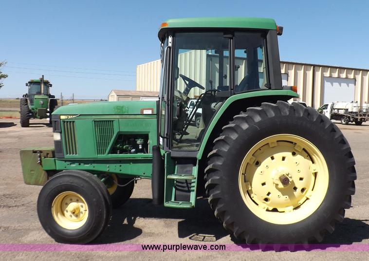 image for item H9096 1998 John Deere 6310 tractor